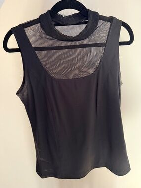 Black Tristan Tanktop. High-neck, mesh detailing $34